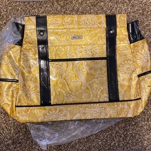 Miche ‘Prima’ shell in yellow with black accents. New in plastic.